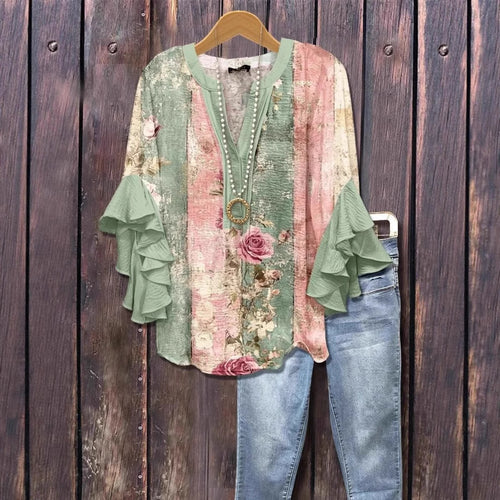 front view of women's floral digital print top
